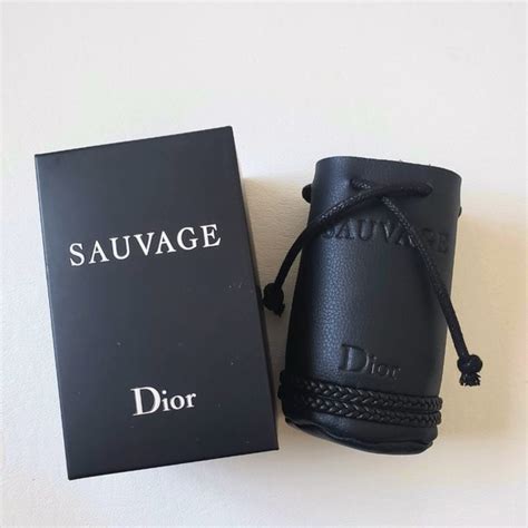 dior sauvage leather pouch|Dior christmas bag.